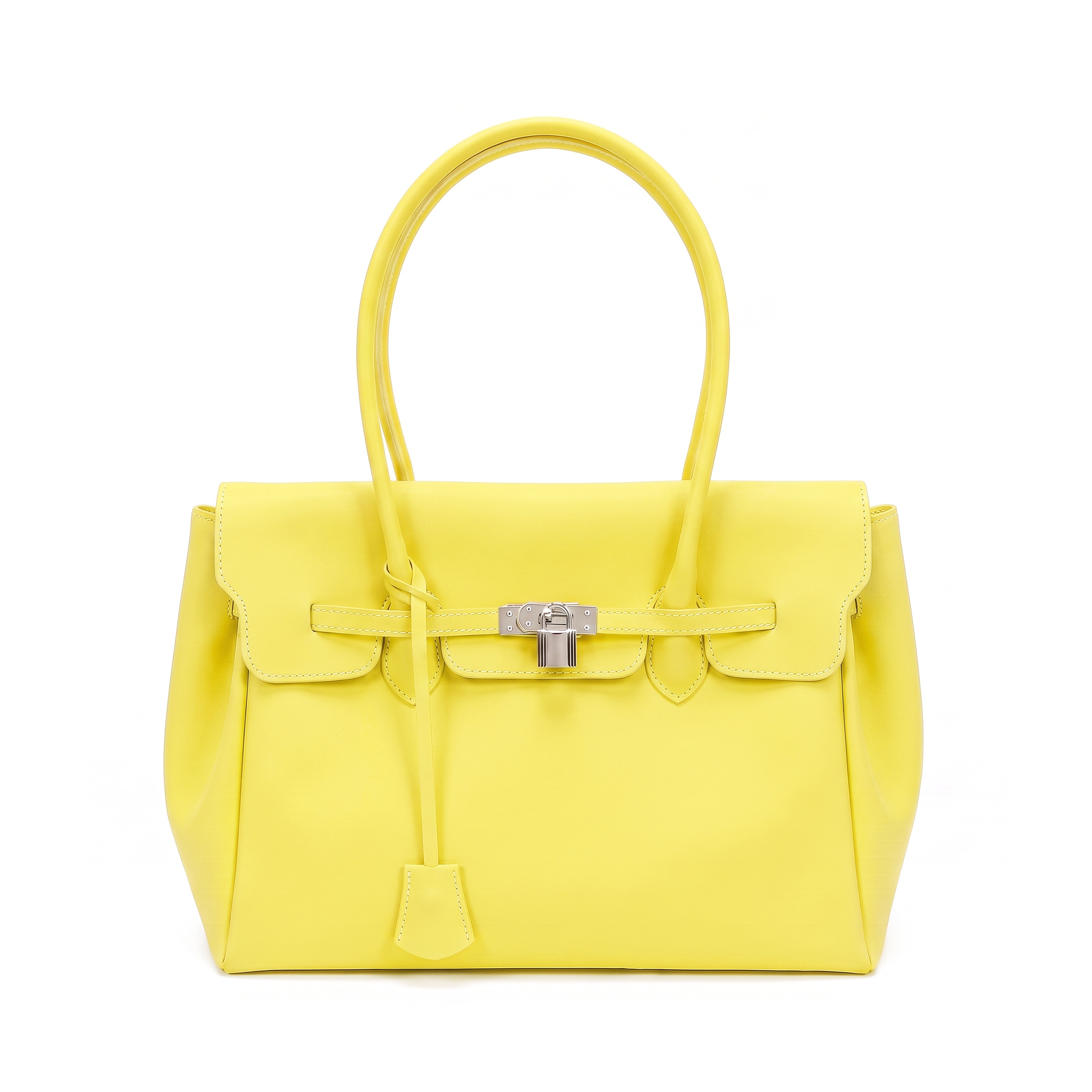 A bright yellow leather handbag with silver-tone hardware, featuring a structured rectangular body, top handle, front flap, and tie detail, photographed on a clean white background.