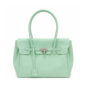 A mint green leather handbag with silver-tone hardware, featuring a structured rectangular body, top handle, front flap, and drawstring detail, photographed on a clean white background.